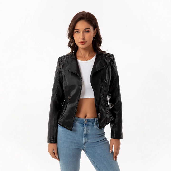 Ladies tailored faux leather biker jacket with quilted shoulder section, asymmetrical zipper and decorative eyelets Mune Fashion