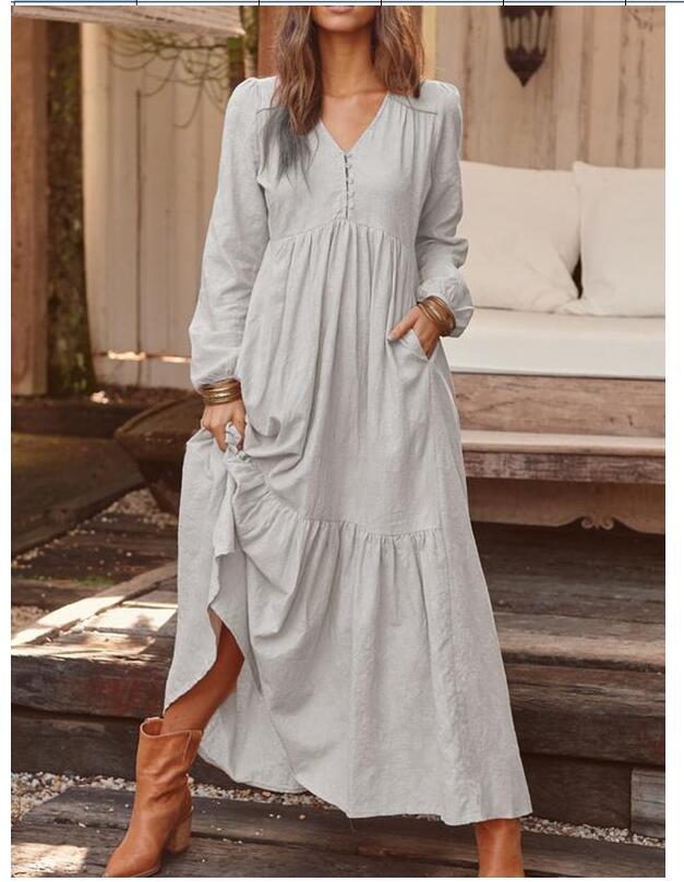 Women's airy maxi dress with V-neck, long sleeves, and inseam pockets Mune Fashion
