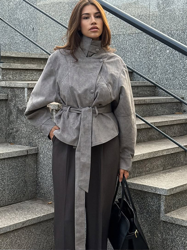 Women's short jacket made of faux suede with a high stand-up collar, waist belt, and boxy oversized silhouette Mune Fashion