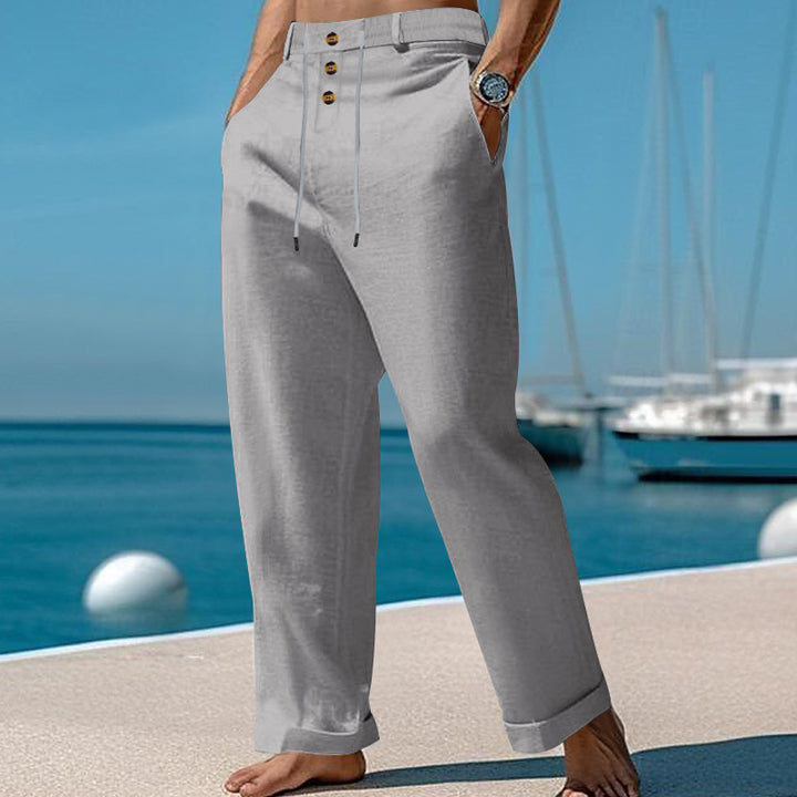 Men's wide summer pants made of linen-cotton blend with triple-button placket, drawstring waistband, and cuffed hem Mune Fashion