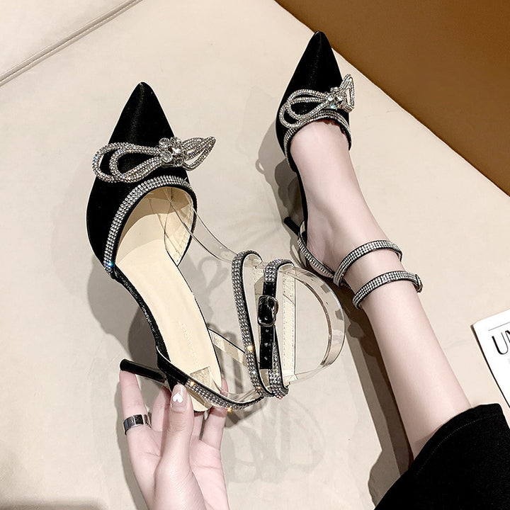 Women's pointed strap pumps with sparkling rhinestone bow appliqué and adjustable ankle strap Mune Fashion