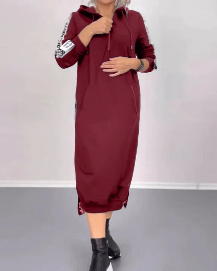 Women's ankle-length hooded sweatshirt dress with half zip, kangaroo pockets and side decorative piping Mune Fashion