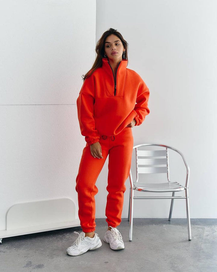 Women's athleisure two-piece set made of thick French terry with a high collar, half zipper, and drawstring pants Mune Fashion