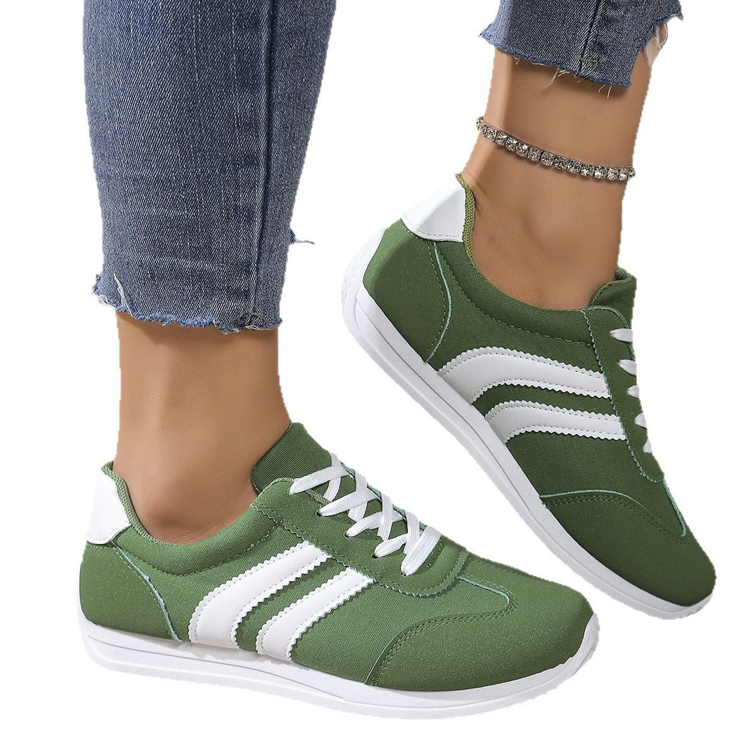 Women's lightweight retro canvas sneakers with padded insole, flexible outsole, and subtle stripe design Mune Fashion