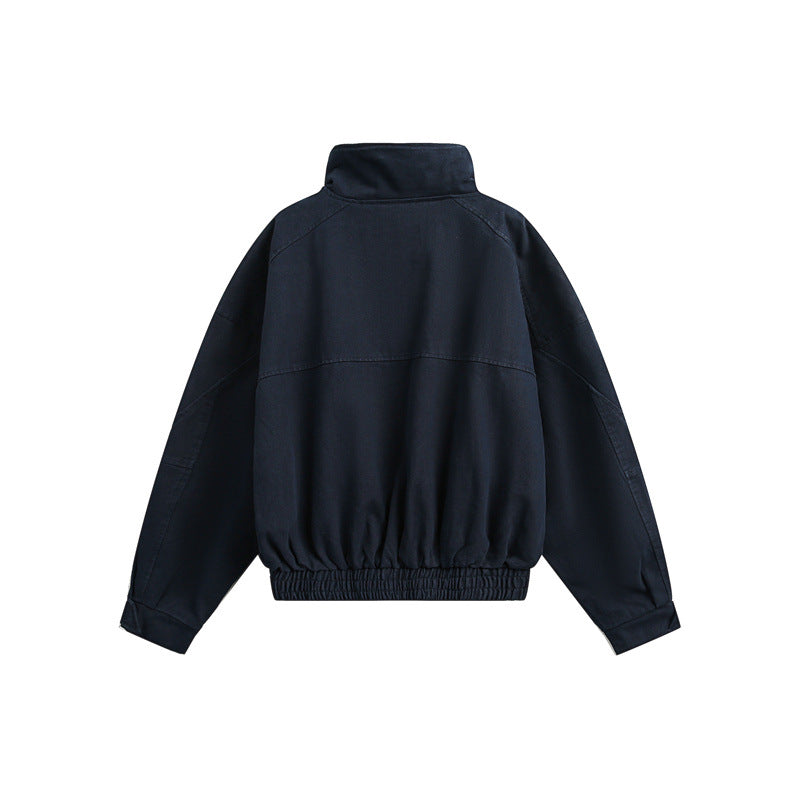 Unisex Short cut Boxy outdoor jacket with concealed zipper placket, high stand-up collar and elastic waistband Mune Fashion