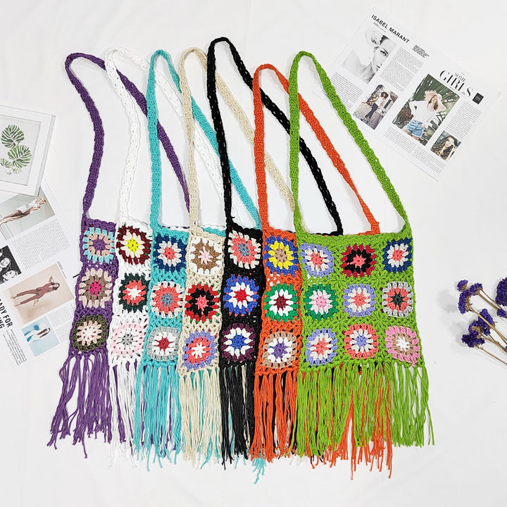 Women crocheted shoulder bag with colorful floral patterns and fringes Mune Fashion