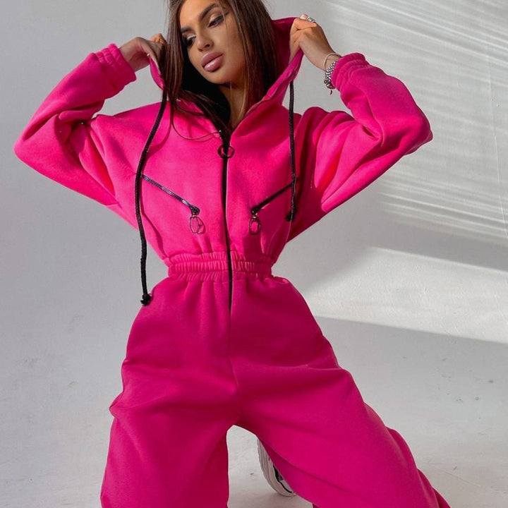 Women's tailored hooded jumpsuit with elastic waistband and striking contrast zippers Mune Fashion