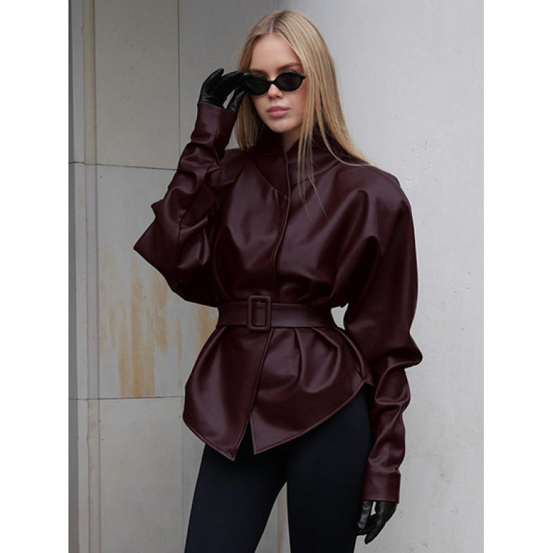 Women's leather look jacket with fitted belt and high stand-up collar Mune Fashion