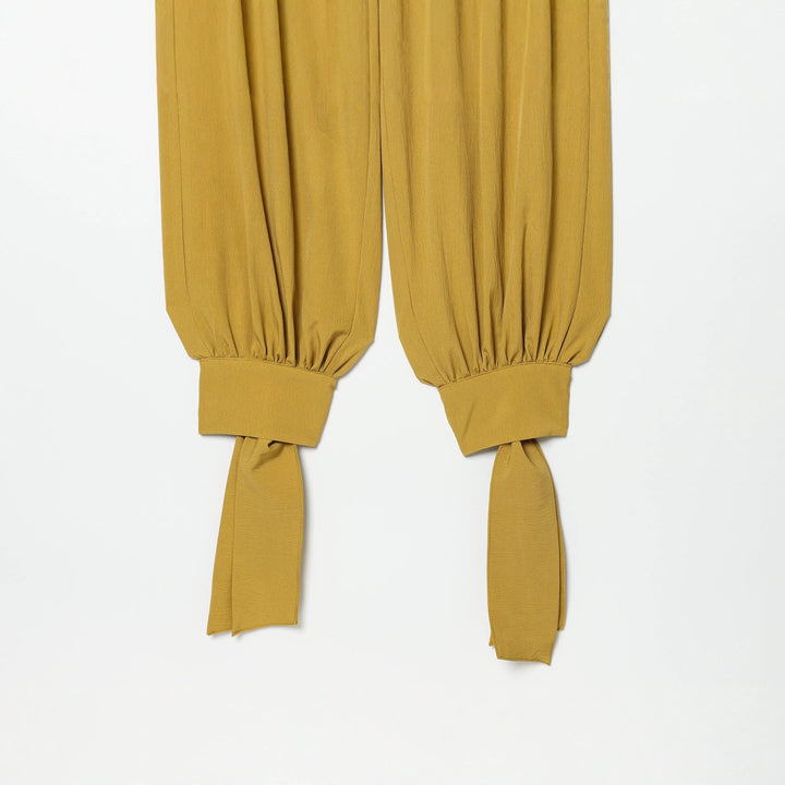 Women’s harem pants with high waistband, pleated folds and knotted cuffs Mune Fashion
