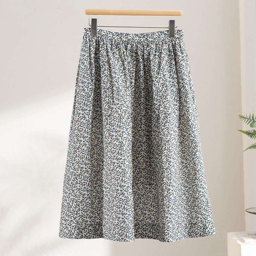 Women's midi skirt with pleated look, gathered waistband and floral print Mune Fashion