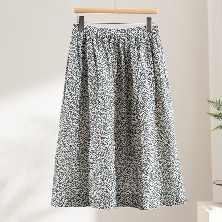 Women's midi skirt with pleated look, gathered waistband and floral print Mune Fashion