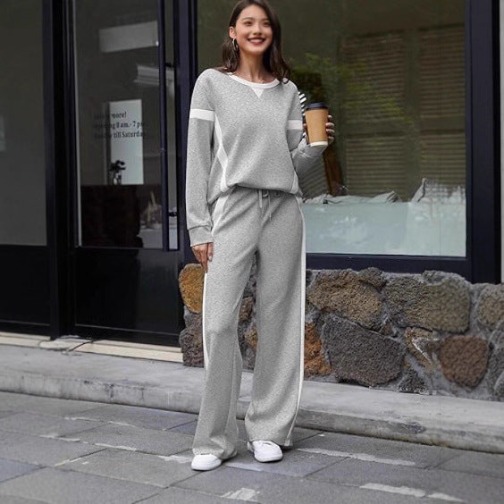 Women nan sports Lounge set with oversized sweatshirt, palazzo pants and side contrast stripes Mune Fashion