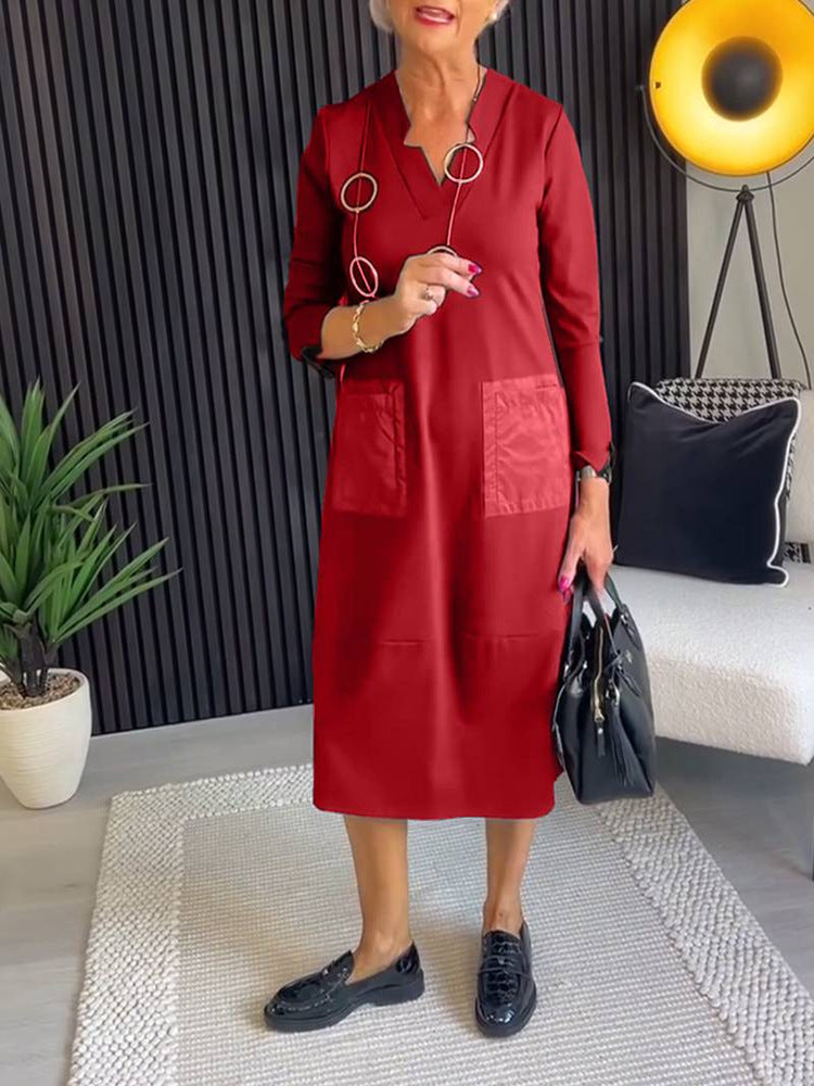 Women's knee-length, loosely falling dress with V-neck contrast pockets made of satin and three-quarter sleeves Mune Fashion