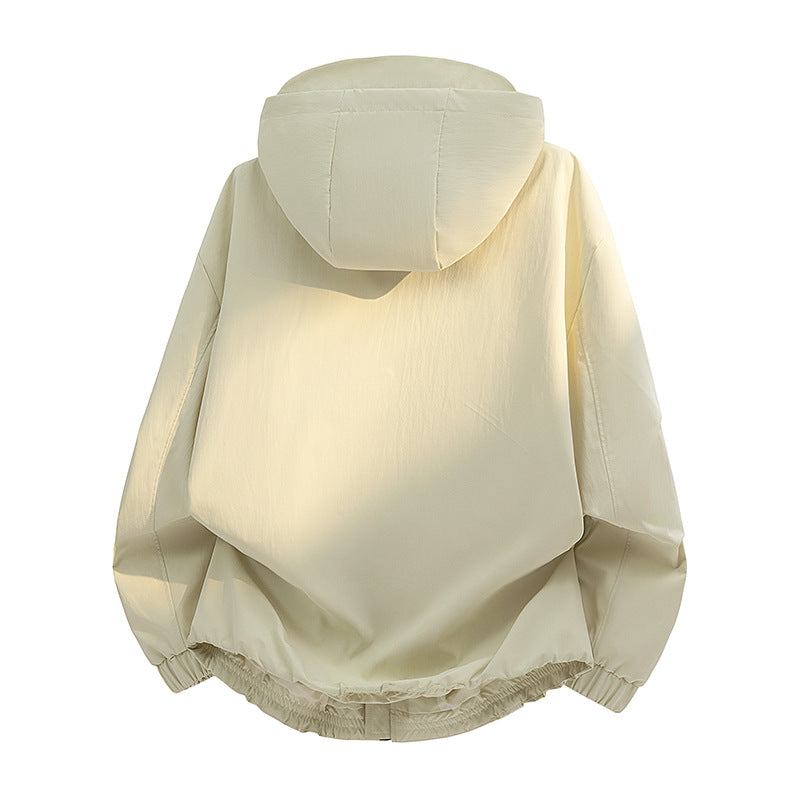 Women's lightweight hooded transitional jacket in oversized cut with elastic hem and concealed zipper pockets Mune Fashion