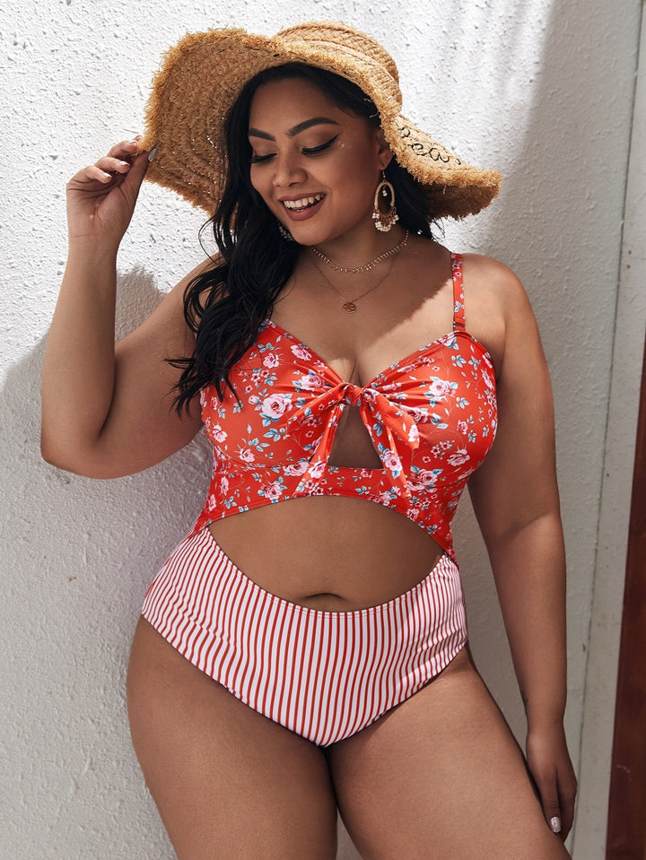 Women's bikini set with playful floral top and striped bottom Mune Fashion