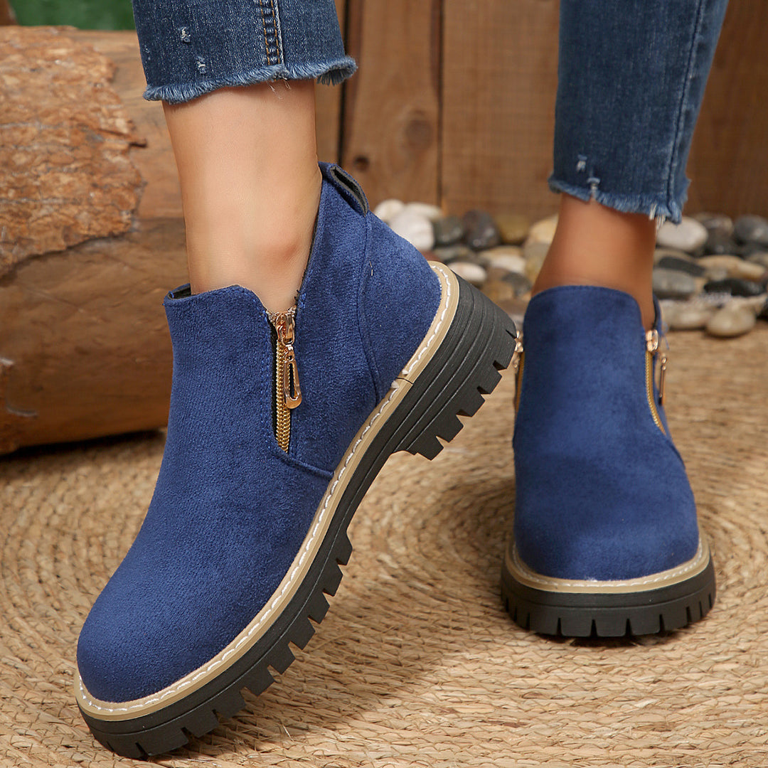 Women's ankle-high boot with decorative zipper, padded shaft, and sturdy profile sole Mune Fashion