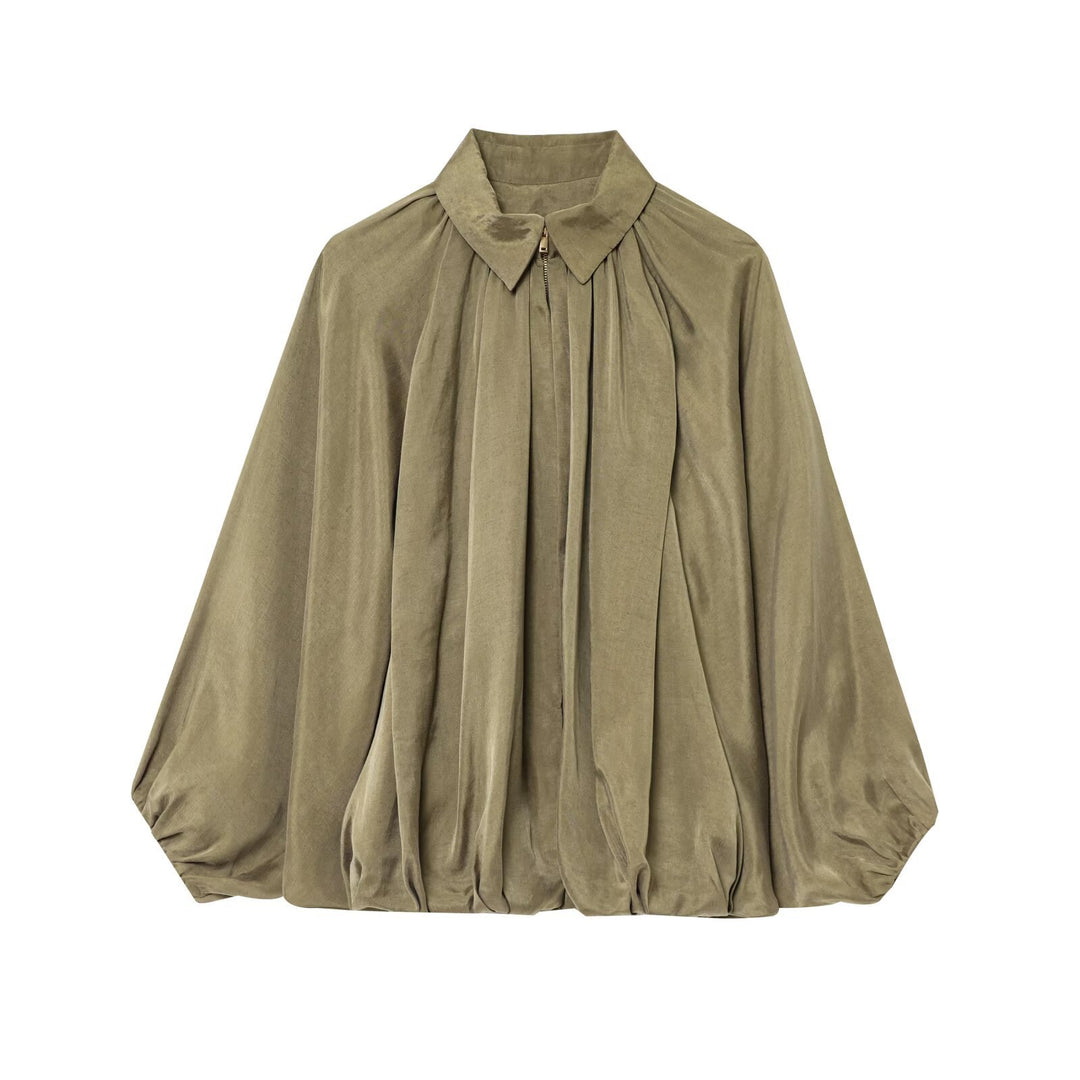 Women's loosely cut cape blouse with continuous zipper, ballooned hem, and gathered sleeves Mune Fashion