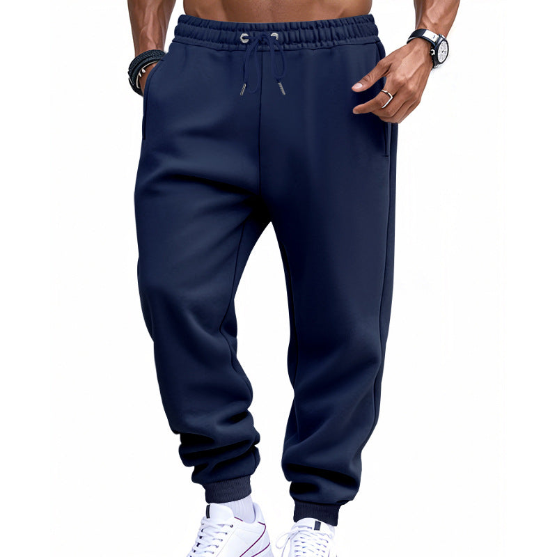 Men's sporty sweat jogging pants with elastic tunnel drawstring waist, ribbed cuffs, and deep side pockets Mune Fashion