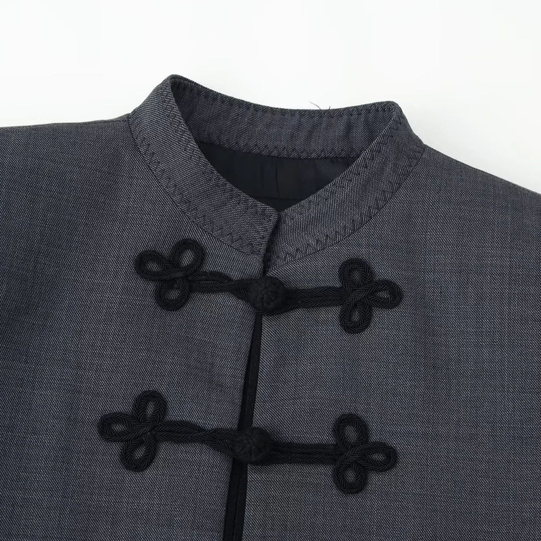 Women's short boxy blazer with stand collar and decorative knot closures Mune Fashion