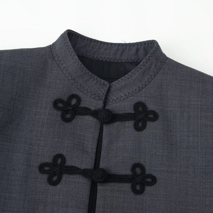 Women's short boxy blazer with stand collar and decorative knot closures Mune Fashion