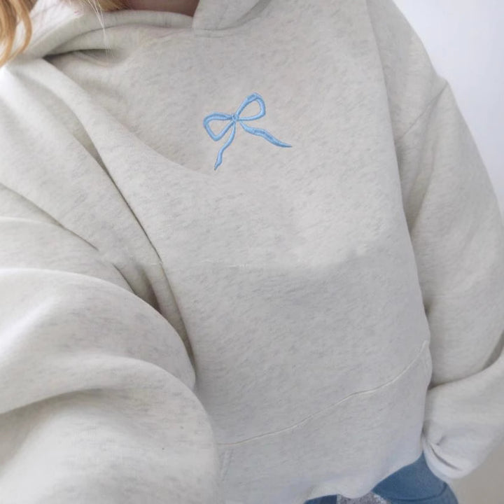 Women's hoodie with floral embroidery design and printed hood lining Mune Fashion