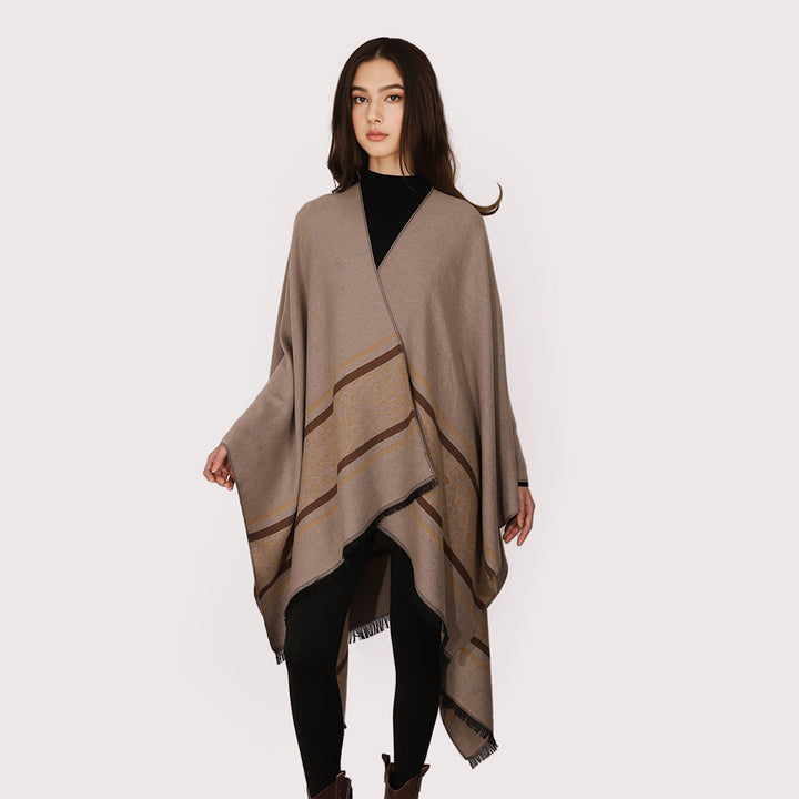Women's cape poncho made of fine knit with leopard border and asymmetrical hem Mune Fashion