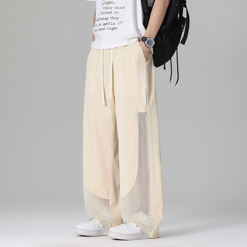 Men's sporty leisure pants with mesh inserts