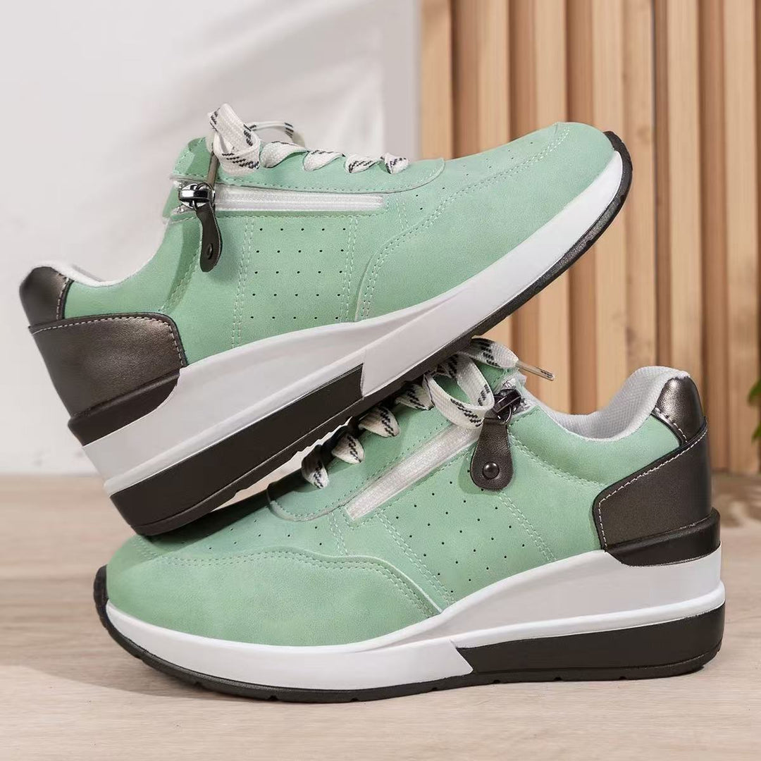 Women's wedge sneakers with side zipper and perforated upper material Mune Fashion