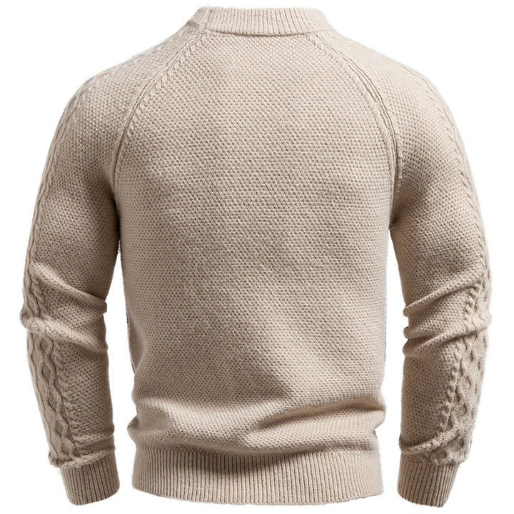 Men's pullover made of textured knit with round neck, attached chest pocket and cable pattern sleeves Mune Fashion