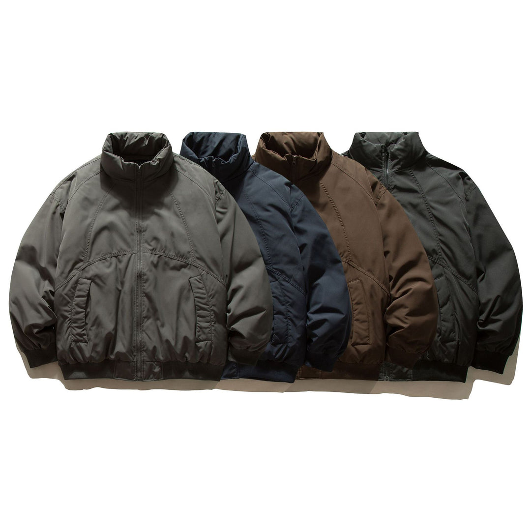 Men's boxy padded bomber jacket with high stand-up collar, elastic hem, and practical side pockets.