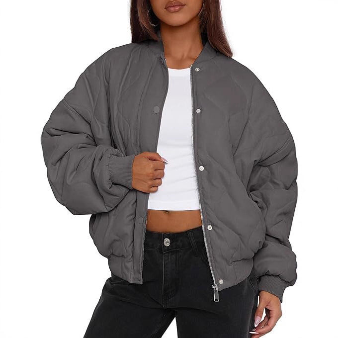 Women's short-cut quilted bomber jacket in oversized look with raglan sleeves Mune Fashion