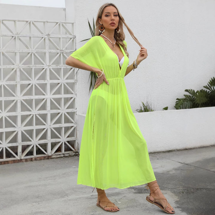 Women elegant maxi dress with deep V-neck and flowing skirt Mune Fashion