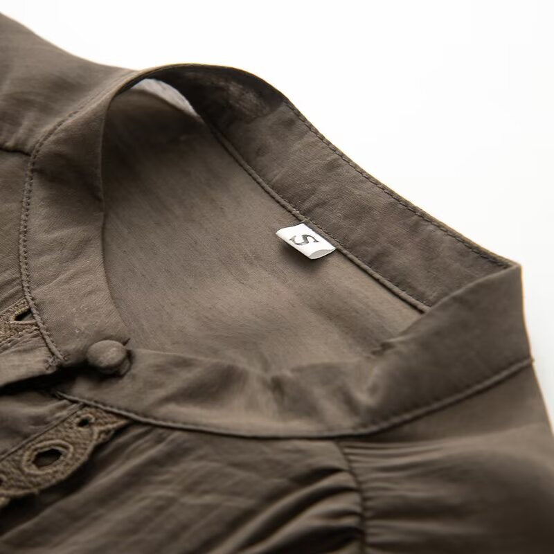 Ladies blouse with lace cutouts, fine button placket and balloon sleeves Mune Fashion