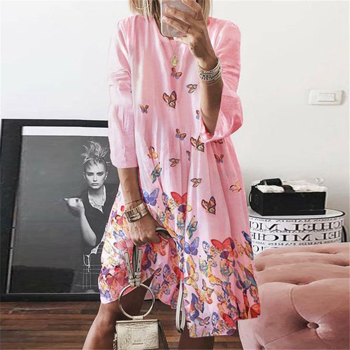 Women's airy midi dress with palm print, half-length sleeves and A-line cut Mune Fashion