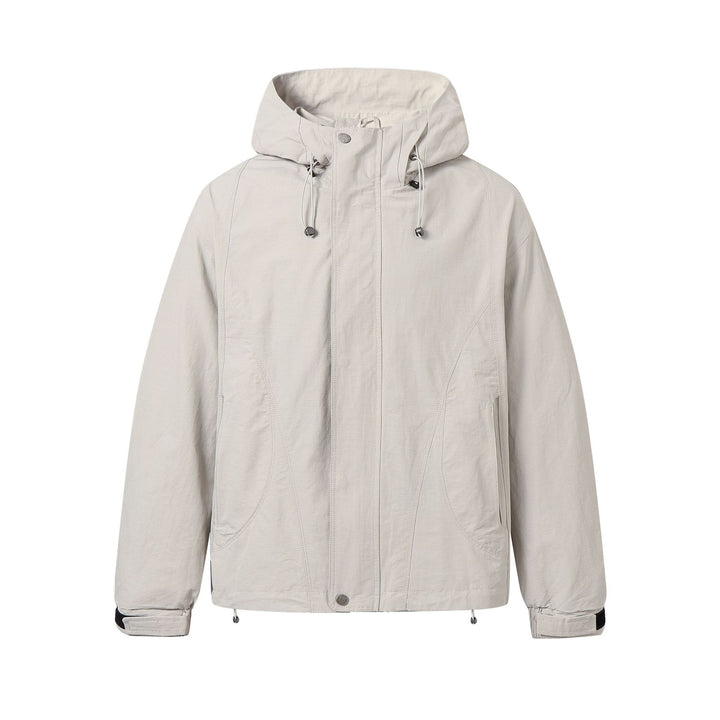 Unisex Short-cut water-resistant hooded jacket in boxy cut with drawstring and adjustable cuffs Mune Fashion