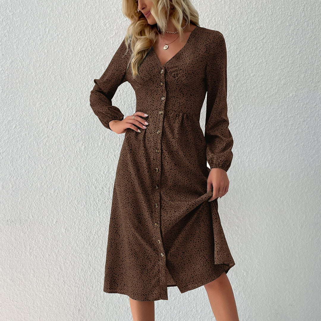 Women's V-neck midi dress with button placket, tailored fit and balloon sleeves Mune Fashion