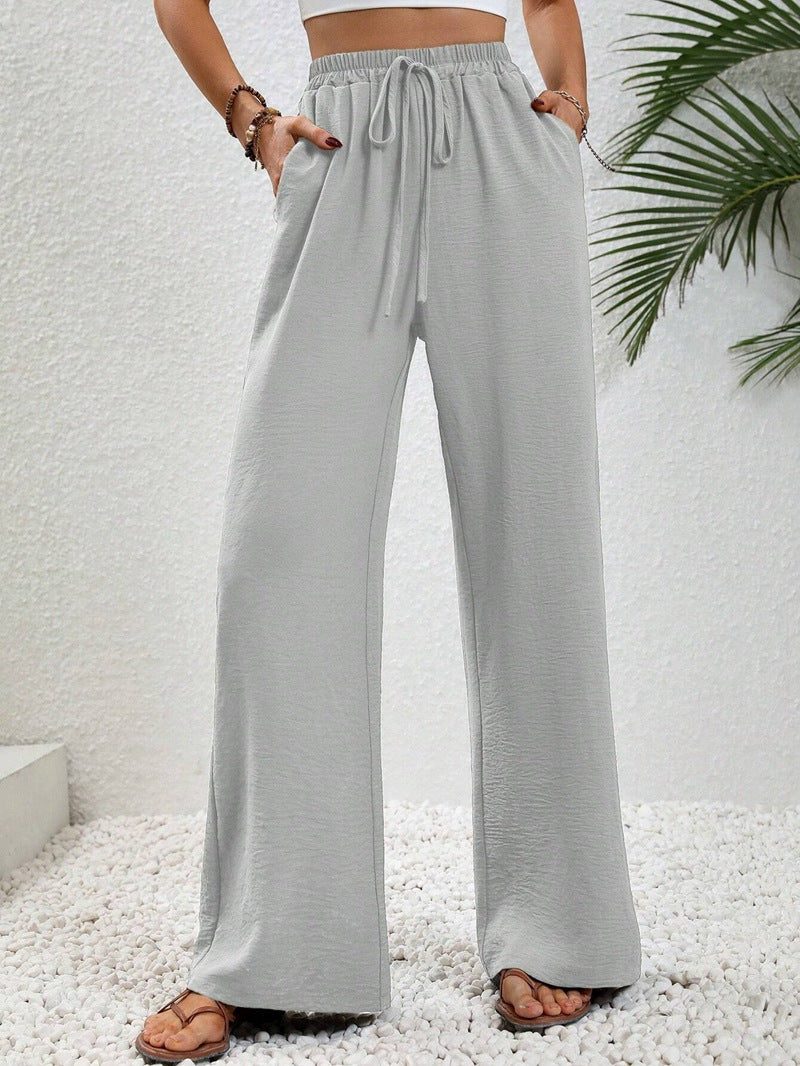 Ladies lightweight, loose-fitting beach pants with elastic waistband, drawstring and side pockets Mune Fashion