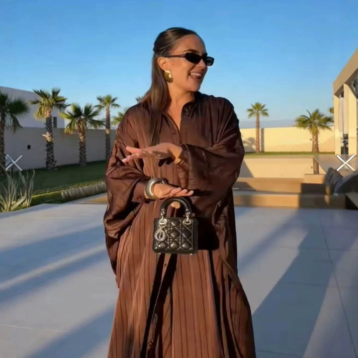 Women’s maxi dress in pleated kaftan style with oversized sleeves and button placket Mune Fashion