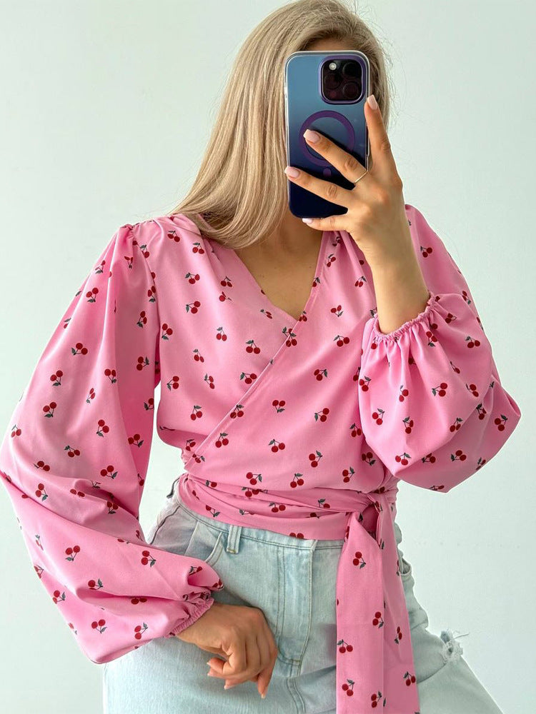 Women's wrap blouse with cherry print, wide puff sleeves & tie belt Mune Fashion