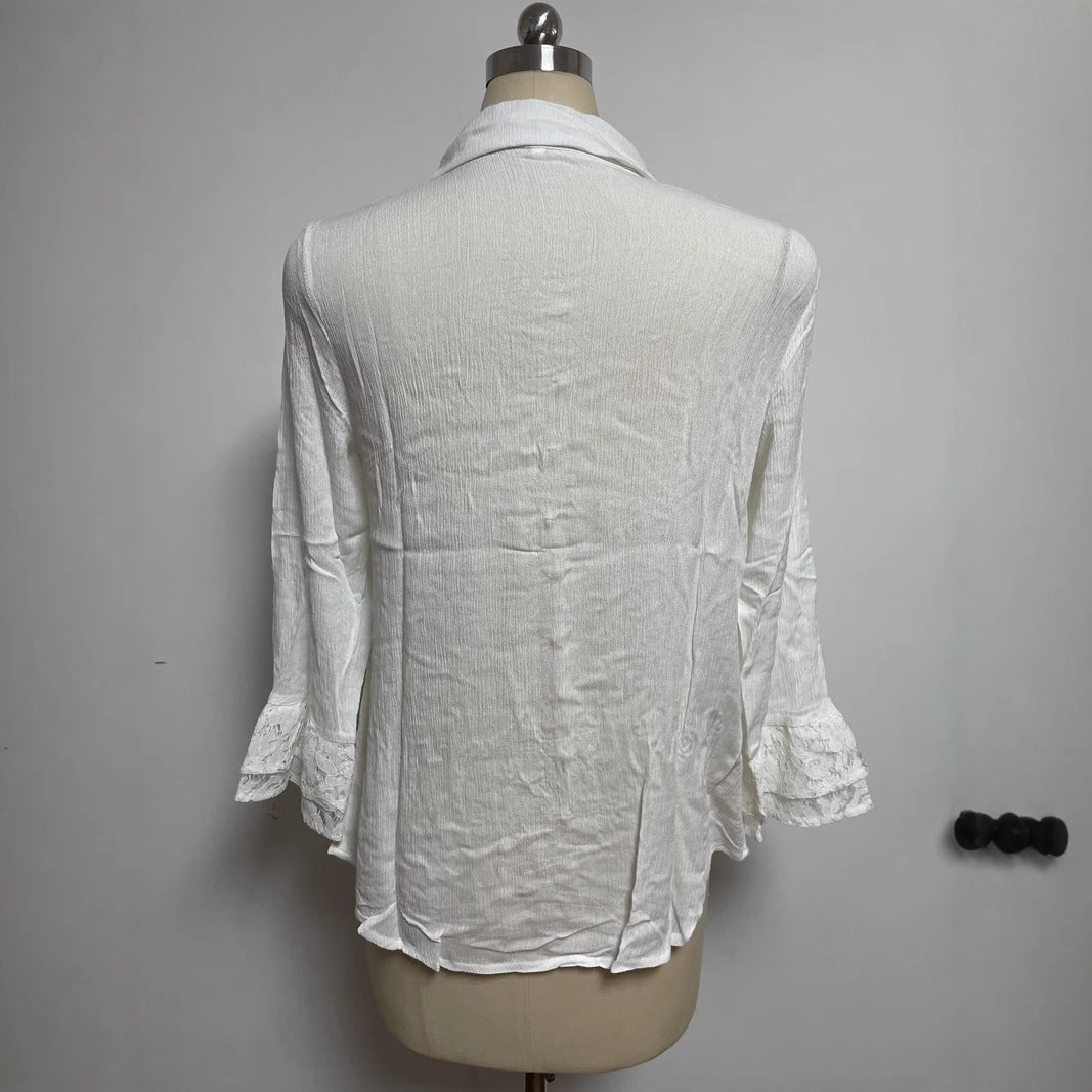 Ladies' semi-transparent crepe blouse with lace yoke, fabric-covered buttons, and three-quarter flounce sleeves Mune Fashion
