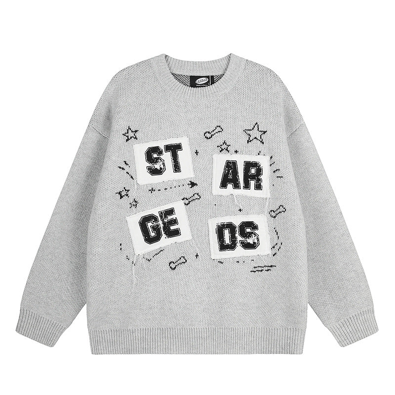 Ladies oversized knit sweater with round neck, appliqués, and vintage letter patches Mune Fashion