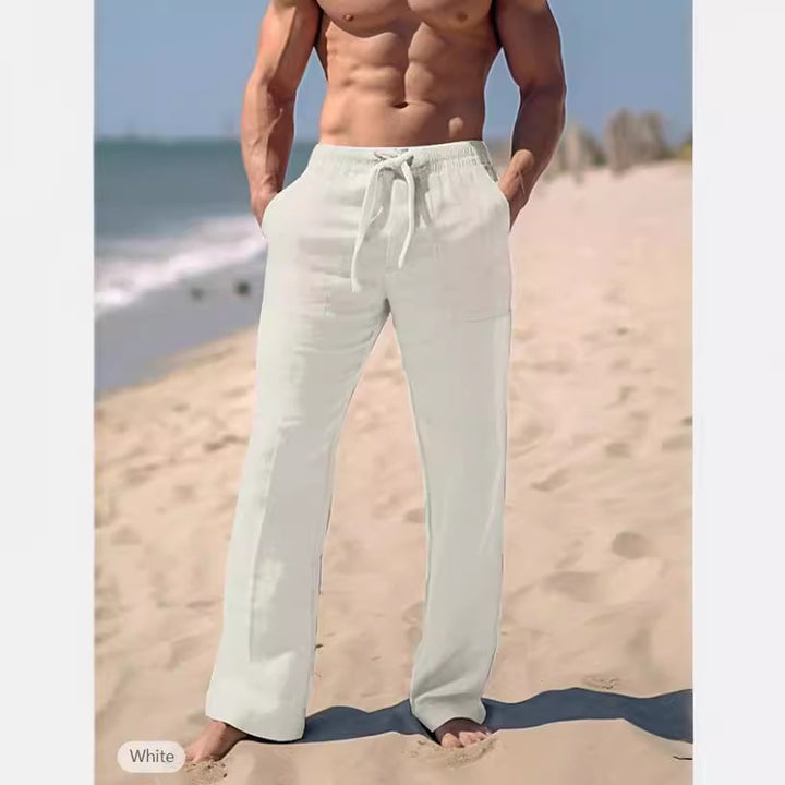 Men's loose resort leisure pants in palazzo style made of linen blend with drawstring and side inset pockets Mune Fashion