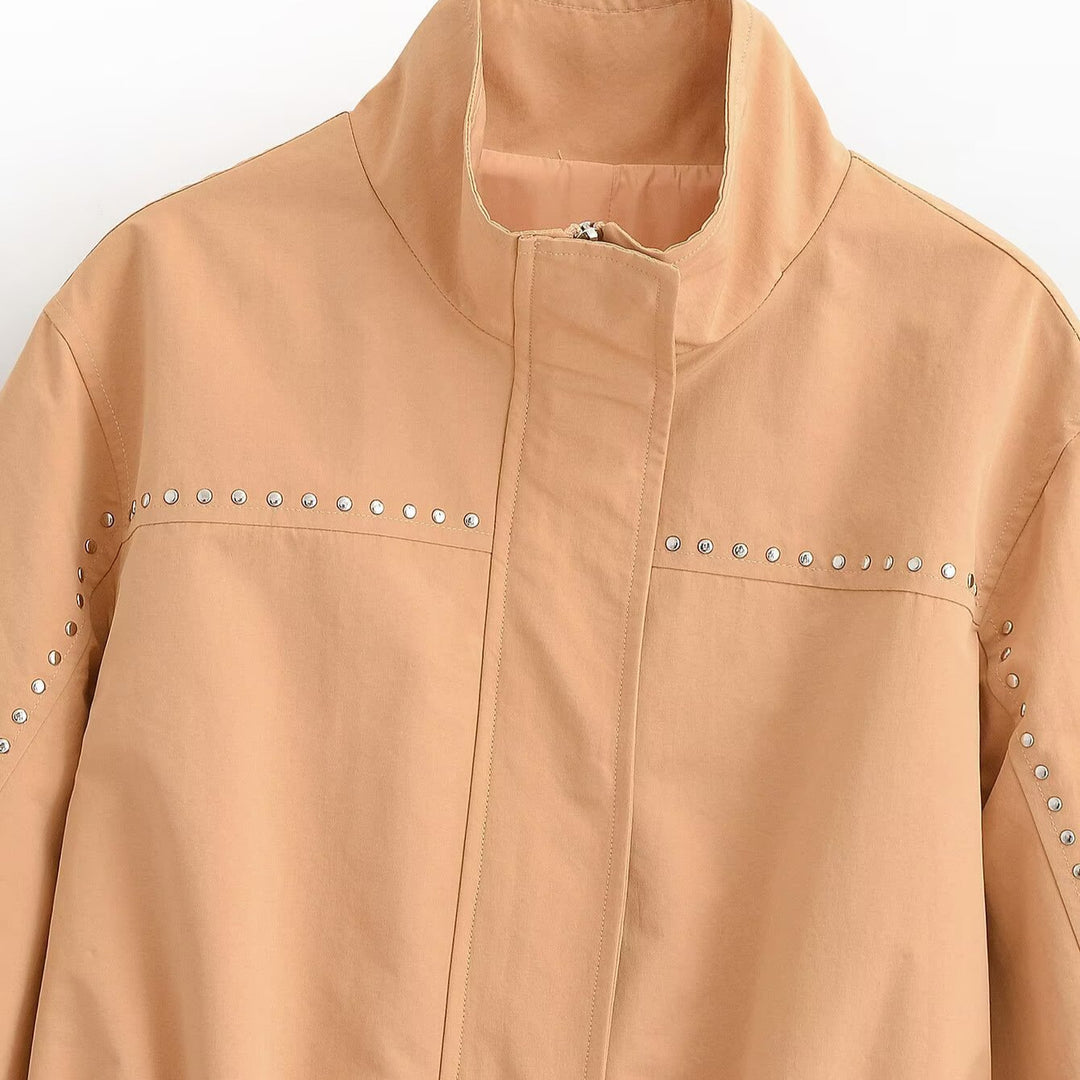 Ladies short jacket with studded details, stand-up collar and waist belt Mune Fashion