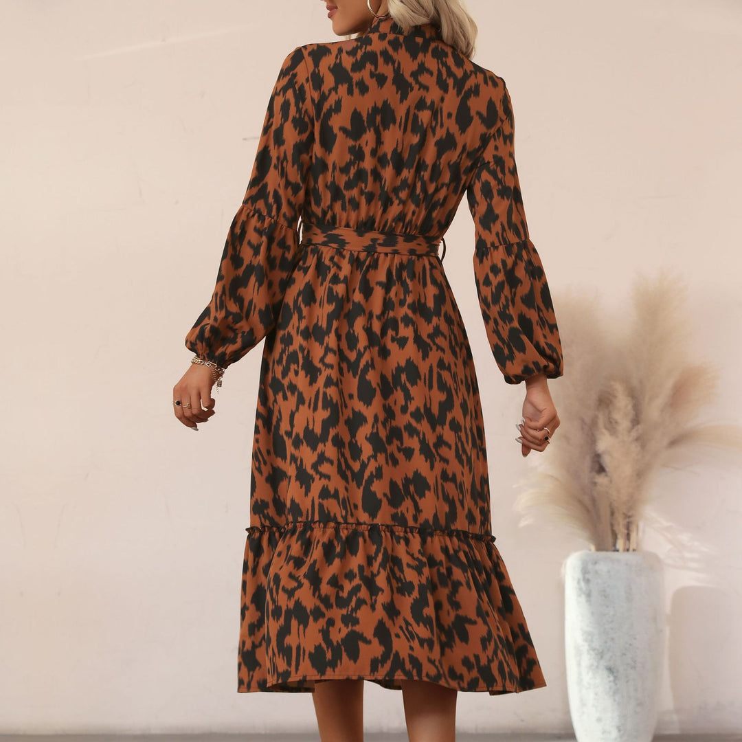 Women’s midi dress with animal print, button placket, waist belt and tiered skirt Mune Fashion