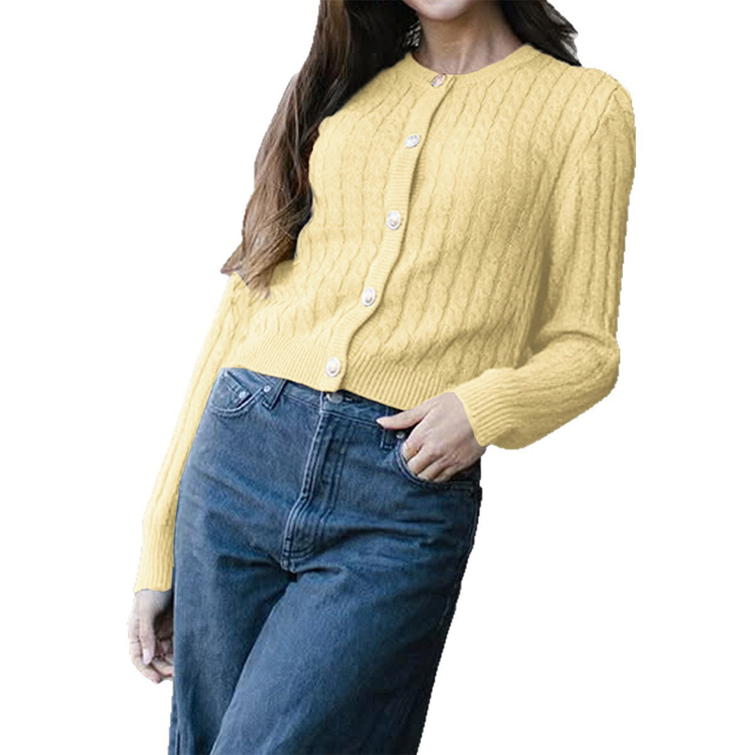 Women’s cropped cable knit cardigan with decorative medallion buttons and round neckline Mune Fashion