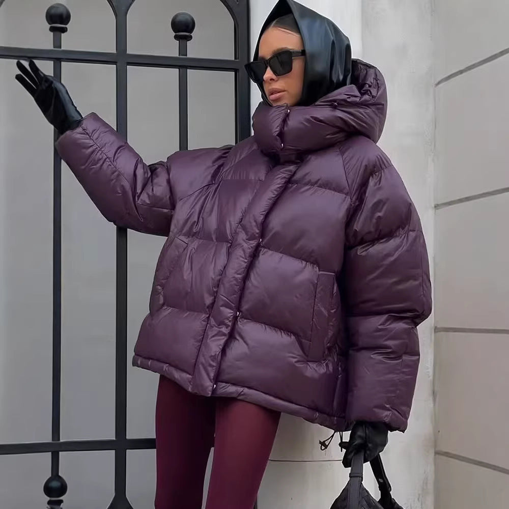 Ladies short padded oversized quilted jacket with high standing collar and hood Mune Fashion