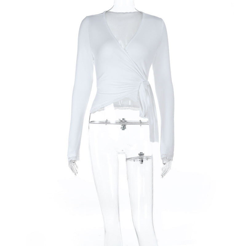 Women's figure-hugging wrap blouse made of stretch jersey with lace trim Mune Fashion