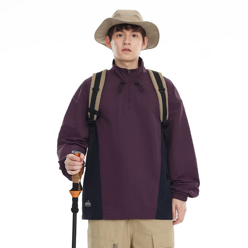 Men's lightweight nylon anorak with half-zip, drawstring hem, and raglan sleeves Mune Fashion