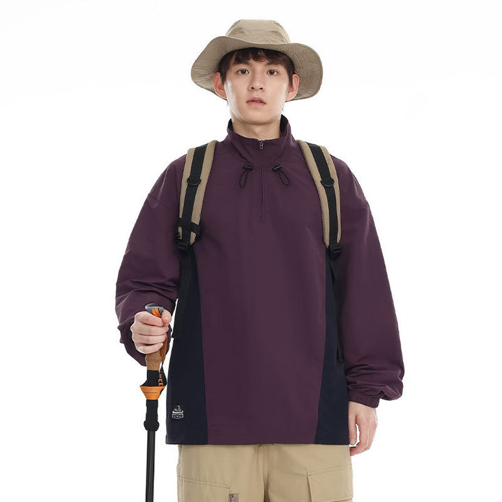 Men's lightweight nylon anorak with half-zip, drawstring hem, and raglan sleeves Mune Fashion