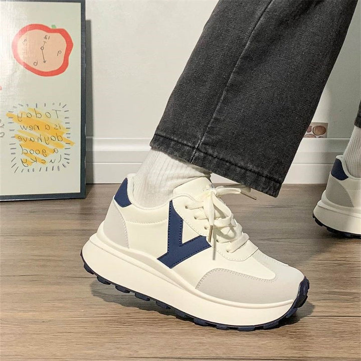 Women's platform sneaker with contrasting V design, thick tread sole and padded comfort collar Mune Fashion